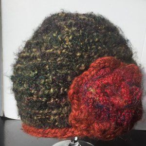 Knitted hat with flower